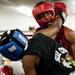 Cleveland boxer Francis Stewart is hit in the face by Soul City boxer Tyler Evans on Friday, July 19. Daniel Brenner I AnnArbor.com